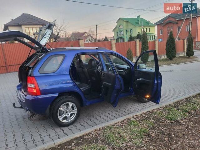 Синий Киа Sportage, объемом двигателя 1.98 л и пробегом 258 тыс. км за 7400 $, фото 74 на Automoto.ua