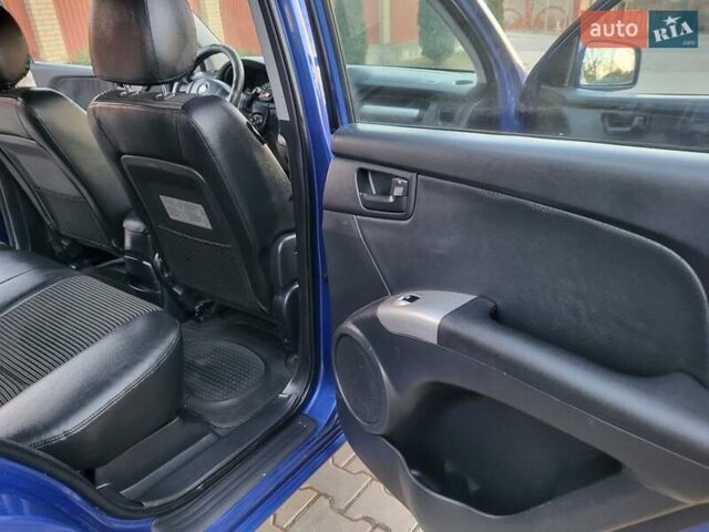 Синий Киа Sportage, объемом двигателя 1.98 л и пробегом 258 тыс. км за 7400 $, фото 85 на Automoto.ua