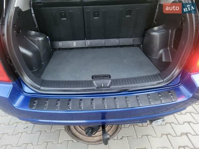 Синий Киа Sportage, объемом двигателя 1.98 л и пробегом 258 тыс. км за 7400 $, фото 95 на Automoto.ua