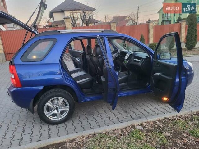 Синий Киа Sportage, объемом двигателя 1.98 л и пробегом 258 тыс. км за 7400 $, фото 75 на Automoto.ua