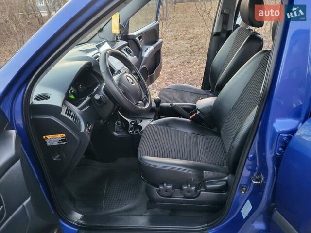 Синий Киа Sportage, объемом двигателя 1.98 л и пробегом 258 тыс. км за 7400 $, фото 103 на Automoto.ua