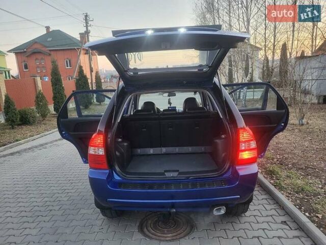 Синий Киа Sportage, объемом двигателя 1.98 л и пробегом 258 тыс. км за 7400 $, фото 71 на Automoto.ua