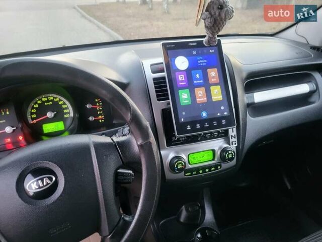 Синий Киа Sportage, объемом двигателя 1.98 л и пробегом 258 тыс. км за 7400 $, фото 123 на Automoto.ua