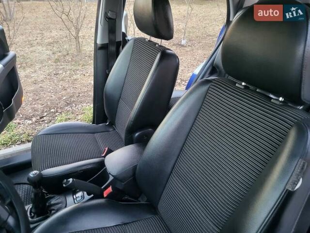 Синий Киа Sportage, объемом двигателя 1.98 л и пробегом 258 тыс. км за 7400 $, фото 105 на Automoto.ua