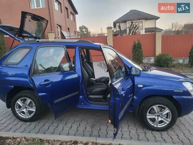 Синий Киа Sportage, объемом двигателя 1.98 л и пробегом 258 тыс. км за 7400 $, фото 76 на Automoto.ua