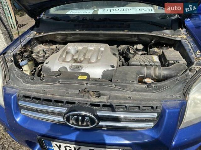 Синій Кіа Sportage, об'ємом двигуна 2 л та пробігом 460 тис. км за 3634 $, фото 6 на Automoto.ua
