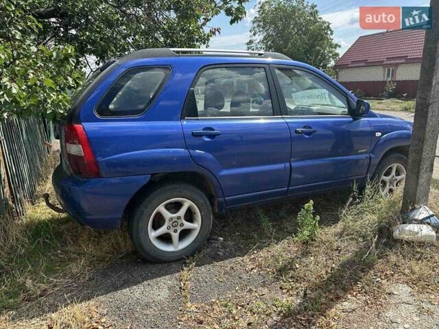 Синій Кіа Sportage, об'ємом двигуна 2 л та пробігом 460 тис. км за 3634 $, фото 3 на Automoto.ua