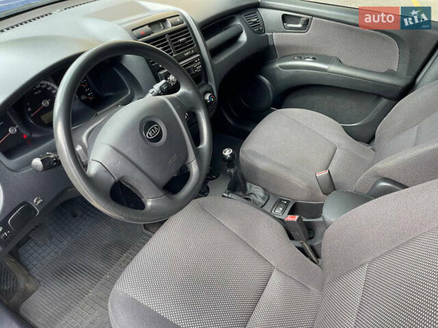 Синий Киа Sportage, объемом двигателя 1.98 л и пробегом 218 тыс. км за 6700 $, фото 8 на Automoto.ua