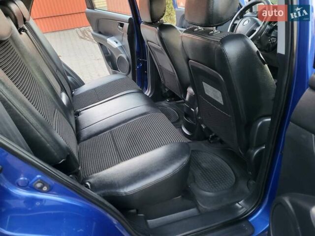 Синий Киа Sportage, объемом двигателя 1.98 л и пробегом 258 тыс. км за 7400 $, фото 86 на Automoto.ua
