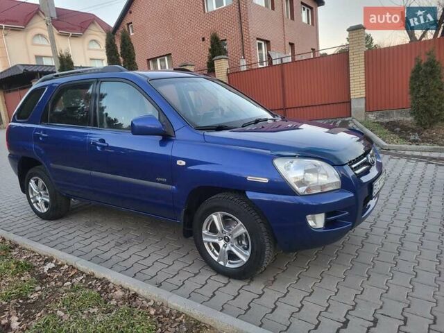 Синий Киа Sportage, объемом двигателя 1.98 л и пробегом 258 тыс. км за 7400 $, фото 42 на Automoto.ua