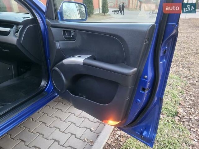 Синий Киа Sportage, объемом двигателя 1.98 л и пробегом 258 тыс. км за 7400 $, фото 83 на Automoto.ua