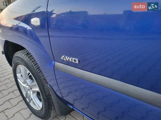 Синий Киа Sportage, объемом двигателя 1.98 л и пробегом 258 тыс. км за 7400 $, фото 31 на Automoto.ua