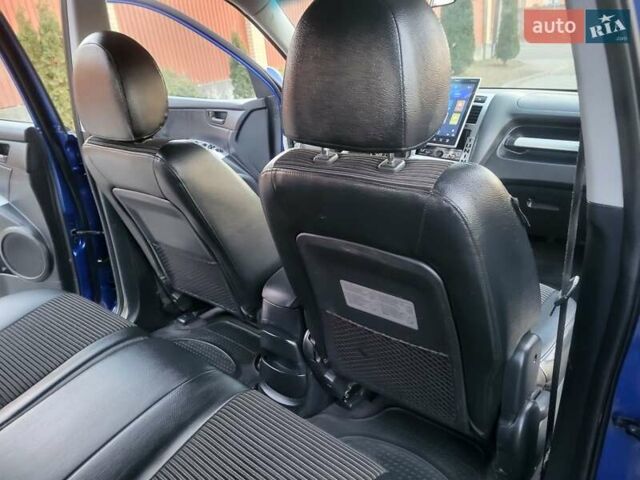 Синий Киа Sportage, объемом двигателя 1.98 л и пробегом 258 тыс. км за 7400 $, фото 90 на Automoto.ua