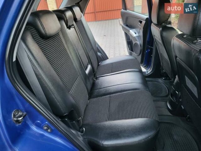 Синий Киа Sportage, объемом двигателя 1.98 л и пробегом 258 тыс. км за 7400 $, фото 88 на Automoto.ua