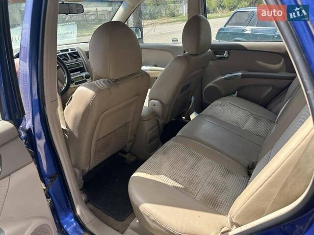Синій Кіа Sportage, об'ємом двигуна 2 л та пробігом 460 тис. км за 3634 $, фото 5 на Automoto.ua