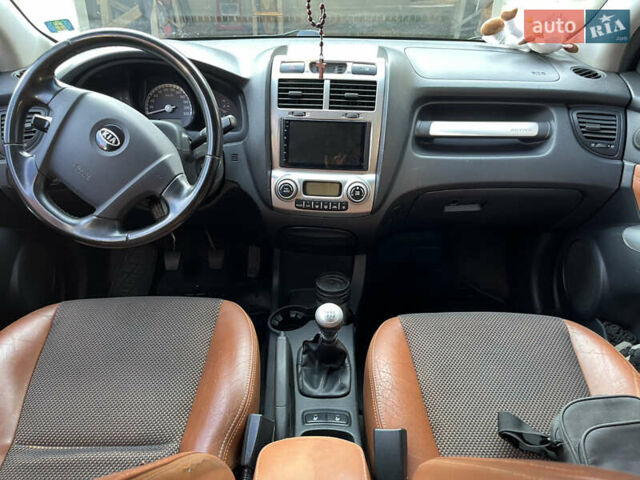 Синій Кіа Sportage, об'ємом двигуна 1.99 л та пробігом 318 тис. км за 7300 $, фото 11 на Automoto.ua