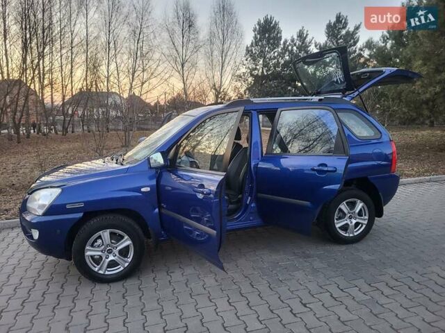 Синий Киа Sportage, объемом двигателя 1.98 л и пробегом 258 тыс. км за 7400 $, фото 64 на Automoto.ua