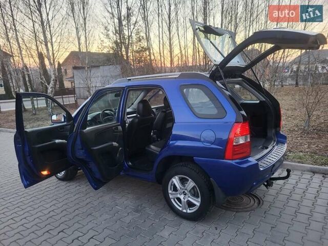 Синий Киа Sportage, объемом двигателя 1.98 л и пробегом 258 тыс. км за 7400 $, фото 68 на Automoto.ua
