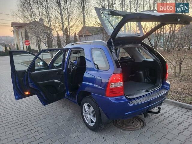 Синий Киа Sportage, объемом двигателя 1.98 л и пробегом 258 тыс. км за 7400 $, фото 57 на Automoto.ua
