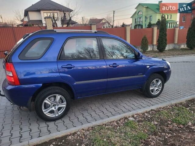 Синий Киа Sportage, объемом двигателя 1.98 л и пробегом 258 тыс. км за 7400 $, фото 39 на Automoto.ua