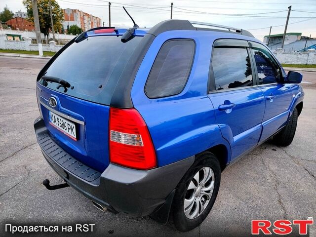 Синій Кіа Sportage, об'ємом двигуна 2 л та пробігом 250 тис. км за 7900 $, фото 4 на Automoto.ua