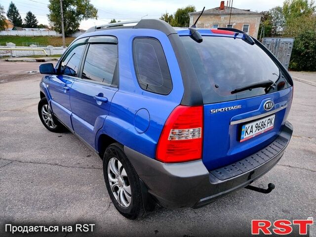 Синій Кіа Sportage, об'ємом двигуна 2 л та пробігом 250 тис. км за 7900 $, фото 3 на Automoto.ua