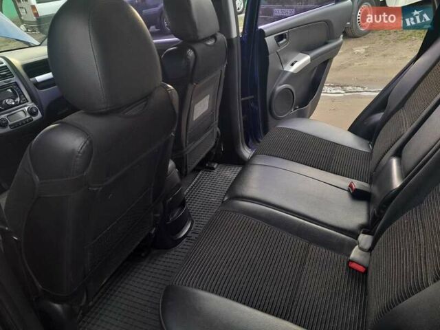 Синий Киа Sportage, объемом двигателя 2 л и пробегом 269 тыс. км за 8000 $, фото 7 на Automoto.ua