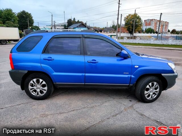 Синій Кіа Sportage, об'ємом двигуна 2 л та пробігом 250 тис. км за 7900 $, фото 1 на Automoto.ua