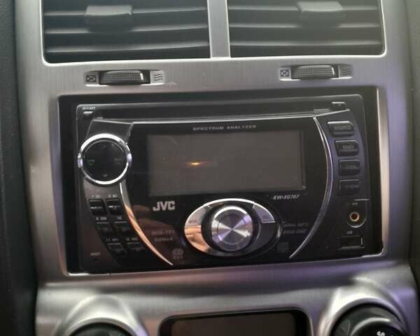 Синий Киа Sportage, объемом двигателя 2 л и пробегом 269 тыс. км за 8000 $, фото 2 на Automoto.ua