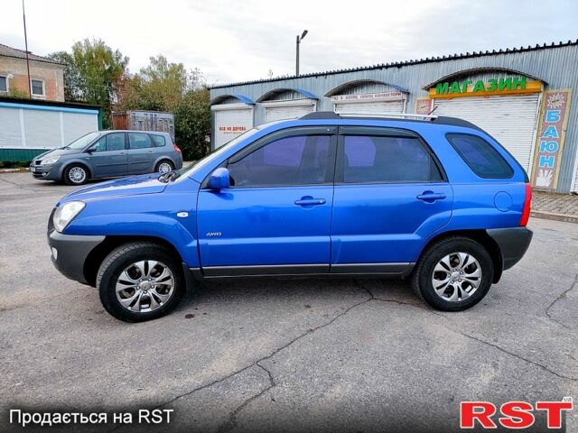 Синій Кіа Sportage, об'ємом двигуна 2 л та пробігом 250 тис. км за 7900 $, фото 2 на Automoto.ua