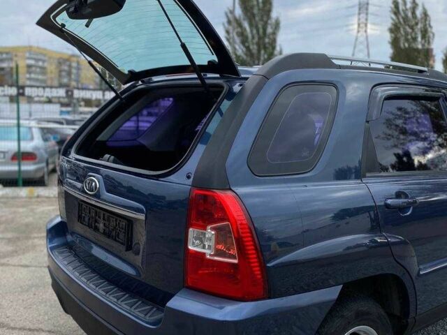 Синий Киа Sportage, объемом двигателя 2 л и пробегом 140 тыс. км за 7799 $, фото 13 на Automoto.ua