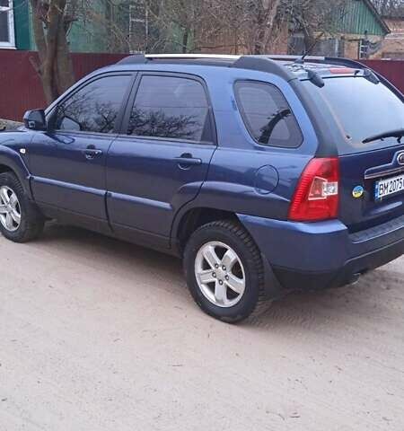 Синий Киа Sportage, объемом двигателя 1.98 л и пробегом 88 тыс. км за 10000 $, фото 3 на Automoto.ua