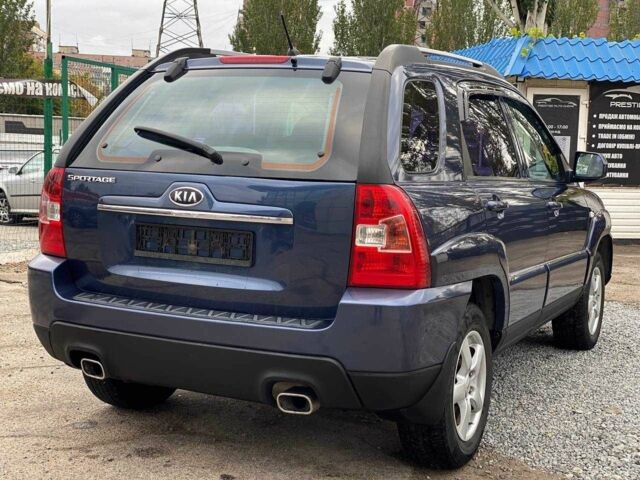 Синий Киа Sportage, объемом двигателя 2 л и пробегом 140 тыс. км за 7799 $, фото 7 на Automoto.ua