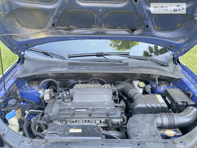 Синій Кіа Sportage, об'ємом двигуна 2 л та пробігом 166 тис. км за 8800 $, фото 14 на Automoto.ua