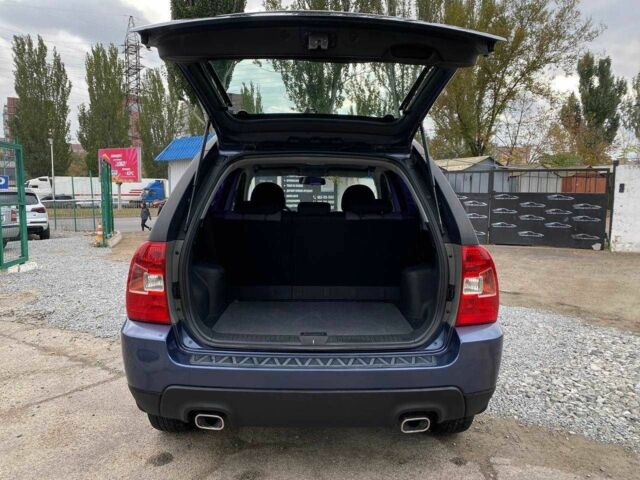 Синий Киа Sportage, объемом двигателя 2 л и пробегом 140 тыс. км за 7799 $, фото 14 на Automoto.ua