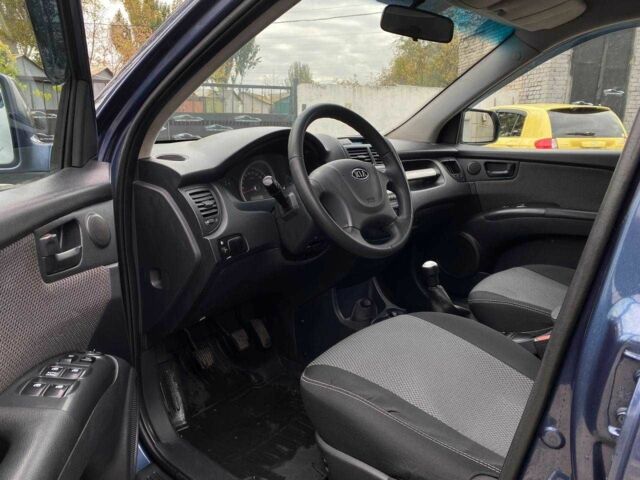 Синий Киа Sportage, объемом двигателя 2 л и пробегом 140 тыс. км за 7799 $, фото 10 на Automoto.ua