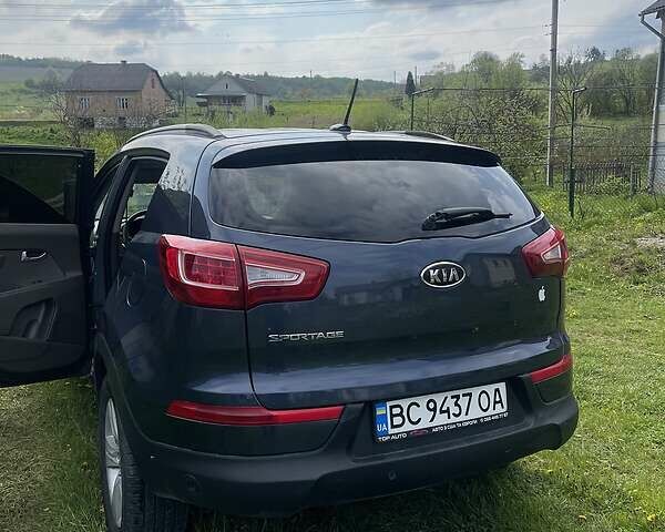 Синій Кіа Sportage, об'ємом двигуна 2.4 л та пробігом 273 тис. км за 10990 $, фото 6 на Automoto.ua