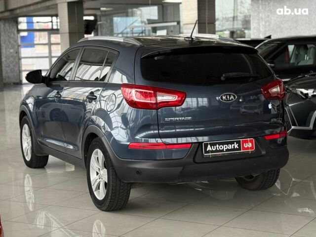 Синий Киа Sportage, объемом двигателя 2.4 л и пробегом 305 тыс. км за 11440 $, фото 4 на Automoto.ua