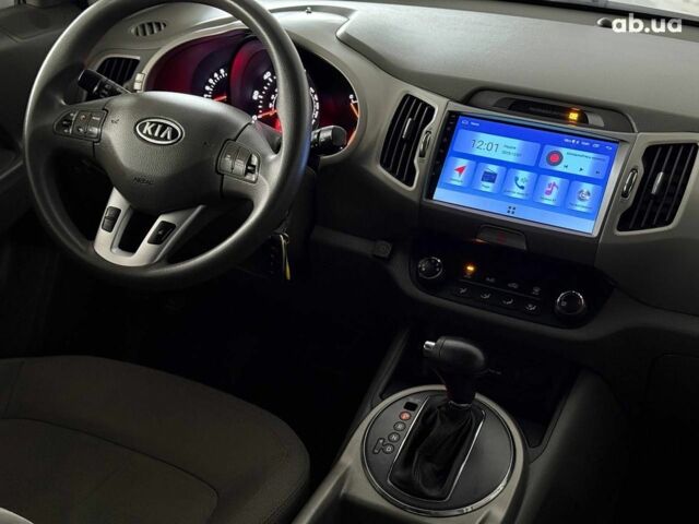 Синий Киа Sportage, объемом двигателя 2.4 л и пробегом 305 тыс. км за 11440 $, фото 16 на Automoto.ua