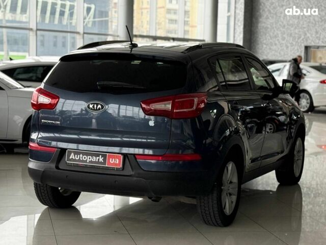 Синий Киа Sportage, объемом двигателя 2.4 л и пробегом 305 тыс. км за 11440 $, фото 6 на Automoto.ua