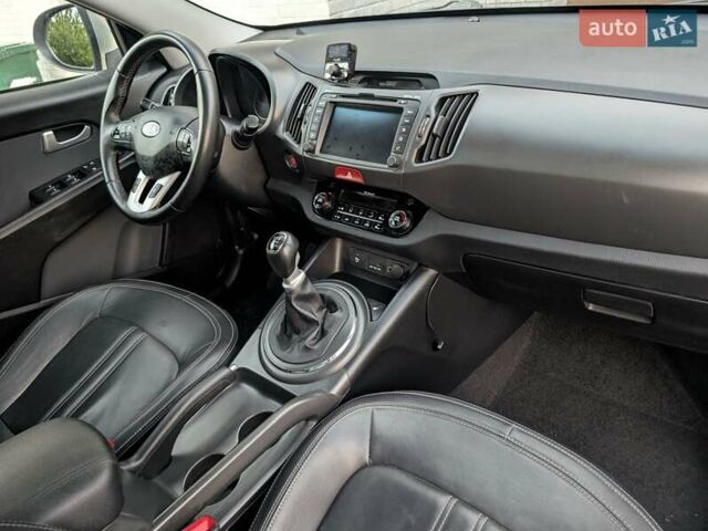 Синий Киа Sportage, объемом двигателя 2 л и пробегом 112 тыс. км за 13000 $, фото 20 на Automoto.ua