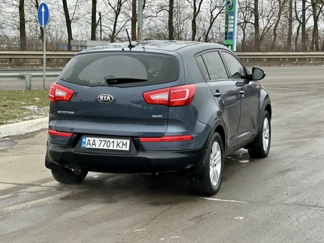 Синий Киа Sportage, объемом двигателя 2.4 л и пробегом 176 тыс. км за 12000 $, фото 4 на Automoto.ua