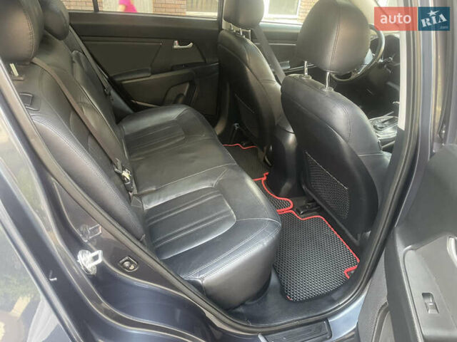 Синий Киа Sportage, объемом двигателя 2.4 л и пробегом 280 тыс. км за 12000 $, фото 11 на Automoto.ua