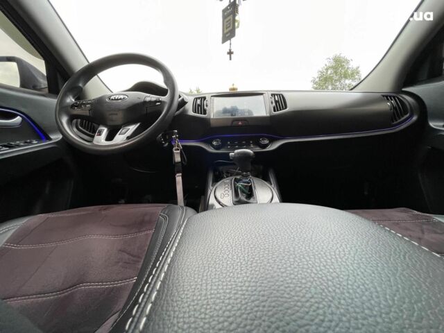 Синий Киа Sportage, объемом двигателя 2.4 л и пробегом 240 тыс. км за 15490 $, фото 35 на Automoto.ua