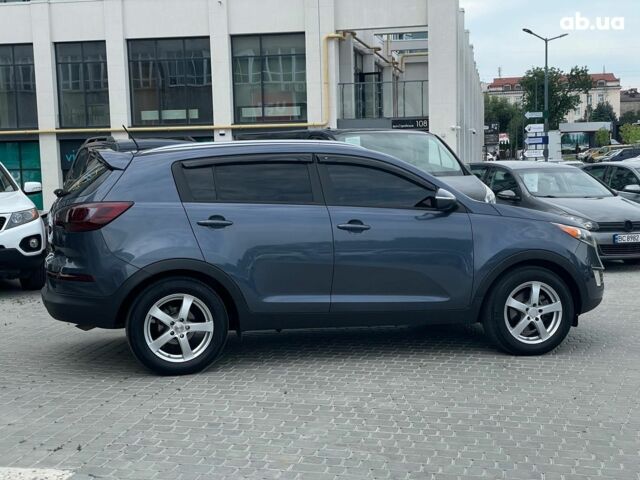 Синий Киа Sportage, объемом двигателя 2.4 л и пробегом 240 тыс. км за 15490 $, фото 4 на Automoto.ua