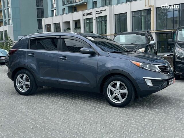 Синий Киа Sportage, объемом двигателя 2.4 л и пробегом 240 тыс. км за 15490 $, фото 3 на Automoto.ua