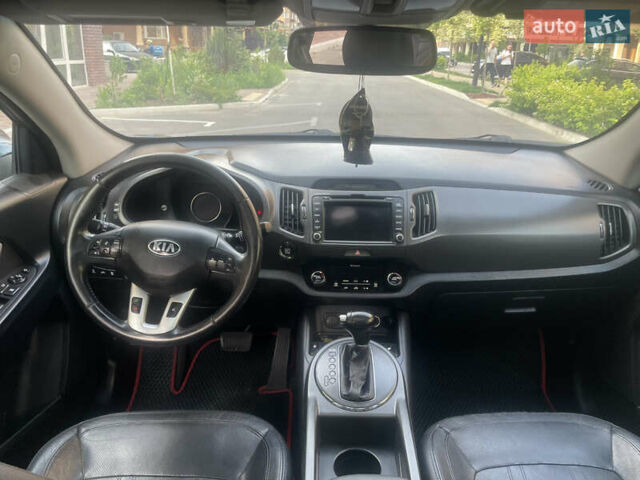 Синий Киа Sportage, объемом двигателя 2.4 л и пробегом 280 тыс. км за 12000 $, фото 12 на Automoto.ua