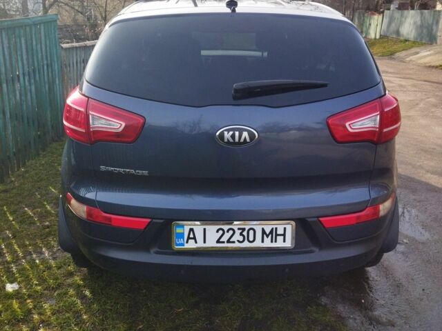 Синий Киа Sportage, объемом двигателя 2.4 л и пробегом 150 тыс. км за 12100 $, фото 5 на Automoto.ua