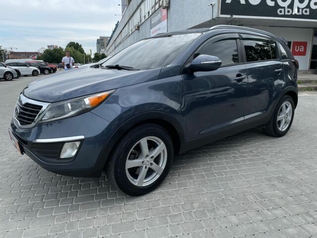 Синий Киа Sportage, объемом двигателя 2.4 л и пробегом 240 тыс. км за 15490 $, фото 9 на Automoto.ua