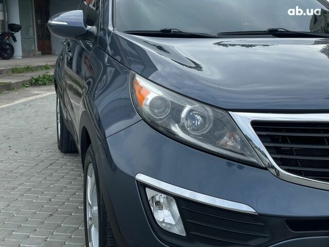 Синий Киа Sportage, объемом двигателя 2.4 л и пробегом 240 тыс. км за 15490 $, фото 11 на Automoto.ua